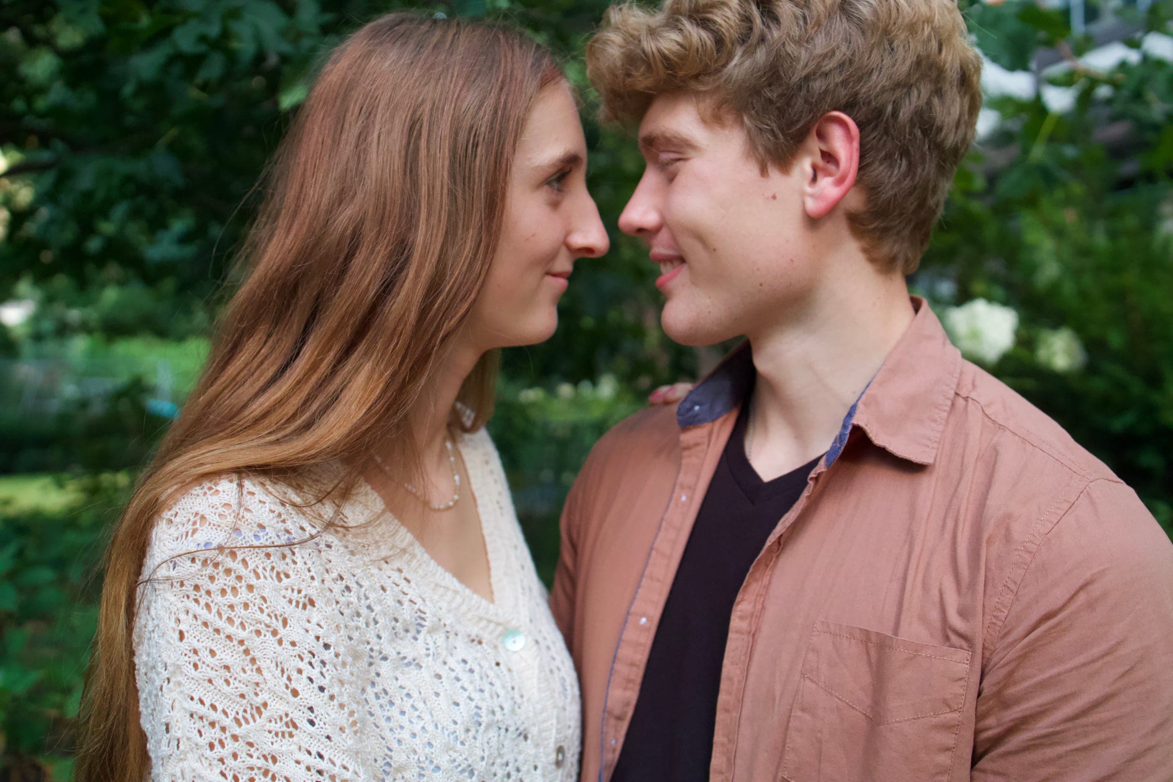 Molly and Tyler nose to nose in the garden